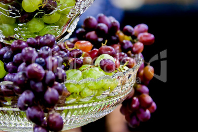 grapes hanging out from crystal dish