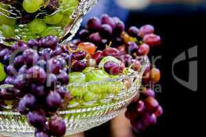 grapes hanging out from crystal dish