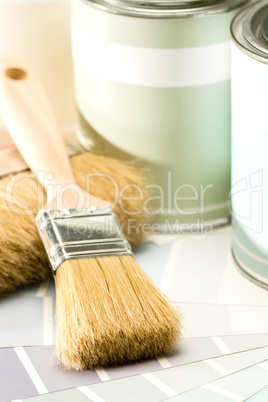 Selection of painting supplies brush and can