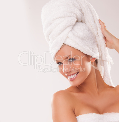 beautiful woman with her hair in a towel
