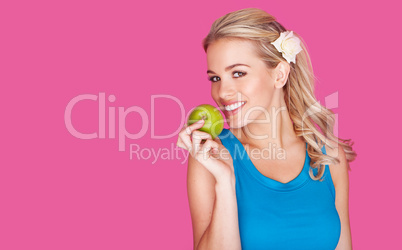 beautiful healthy young woman with an apple