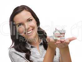 Smiling Mixed Race Woman Holding Small House Isolated on White