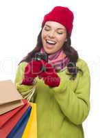 Mixed Race Woman Holding Shopping Bags Texting On Cell Phone