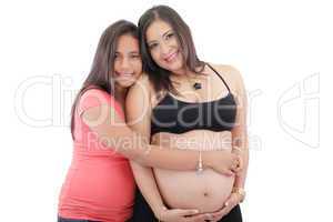 beautiful pregnant woman and her daughter