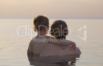 mother and son watching the sunset