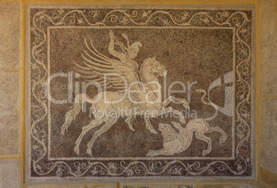 mosaic on wall in the archaeological museum of rhodes greece.