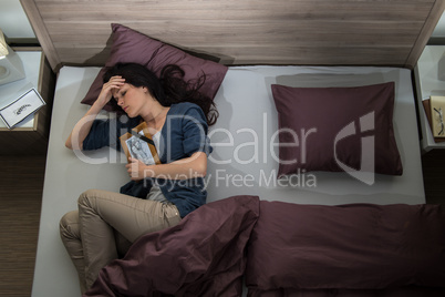 Lonely woman in bed missing dead husband