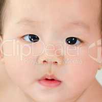 Asian baby boy close up face