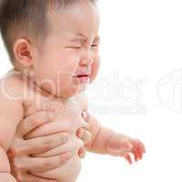 Sad Asian baby boy crying