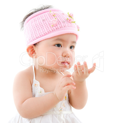 Asian baby girl eating