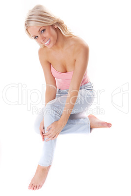sexy casual blond kneeling on the floor
