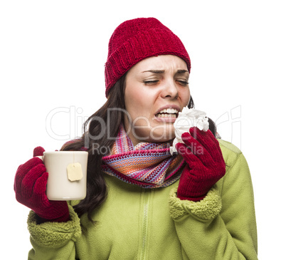 Sick Mixed Race Woman Drinks Hot Tea While Blowing Nose .