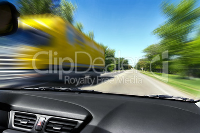 blurred on the speed of the movement of trucks on the road