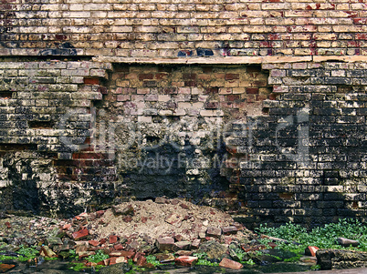 old crumbling brick wall as background