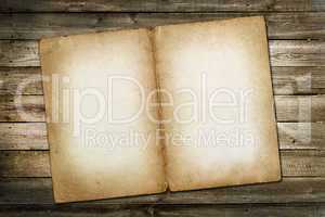 old vintage paper on wooden grungy background