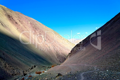 gorge in the mountains, lit by the sun