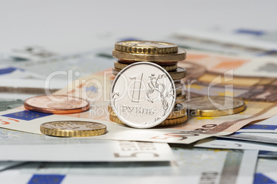 one ruble and the euro (coins and banknotes)