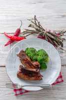 grilled ones rib with broccoli