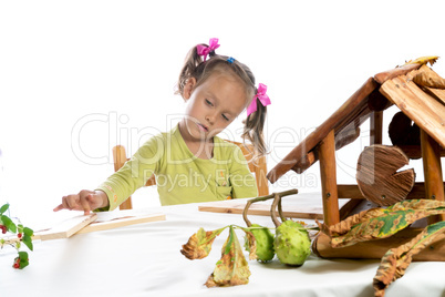 small girls in do handicraft