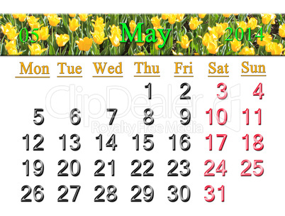 calendar for may of 2014 with tulips on the flower-bed