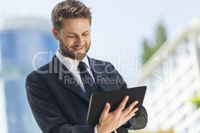 Businessman Using Tablet Computer