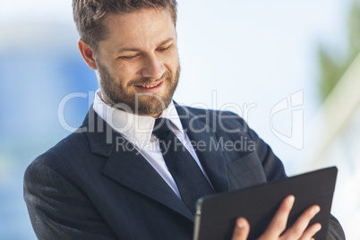 Businessman Using Tablet Computer