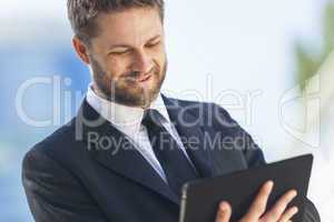 Businessman Using Tablet Computer