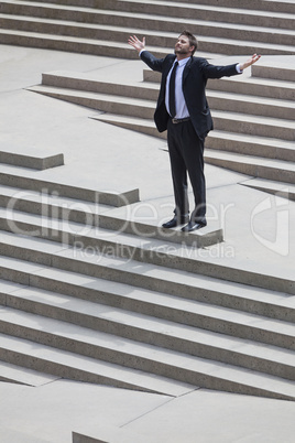 Businessman Business Man Arms Outstretched on Steps