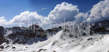 panorama of snowy mountains in sun day