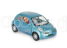wow expression of a boy in the blue car