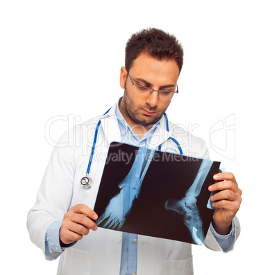 Handsome young doctor with radiography