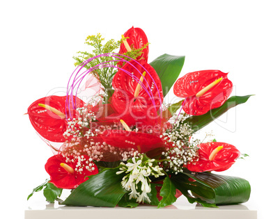 Basket of red anthurium flowers