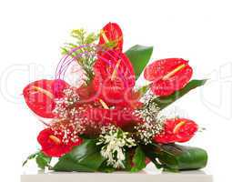 Basket of red anthurium flowers