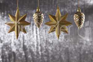 a group of christmas pine cone and star