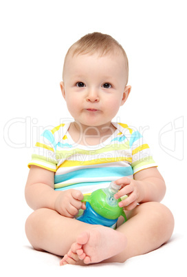 baby boy holding milk bottle