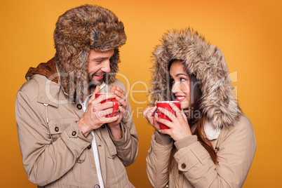 portrait of a couple wearing a winter coats