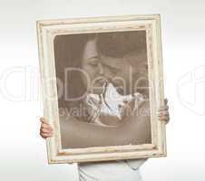 woman holding a romantic picture