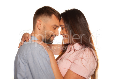 young romantic smiling couple embraced