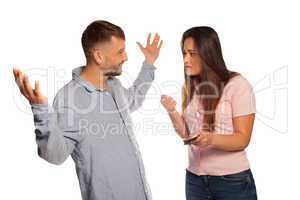 young couple having an argument with defensive man