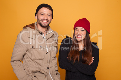 trendy young couple with winter clothing
