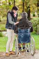 woman next to man in wheelchair