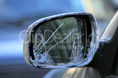 damaged rearview mirror on a car
