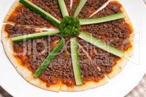 turkish beef pizza with cucumber on top