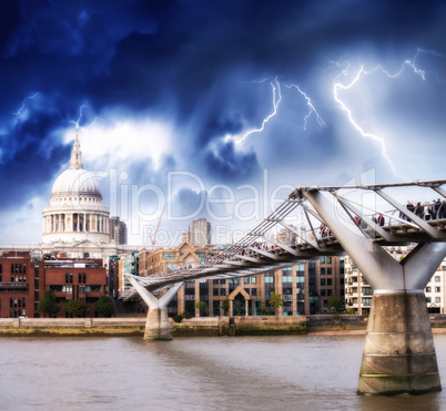 The Millennium Bridge and St Paul Cathedral. Bad weather in Lond