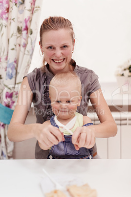 mother with son in cafe