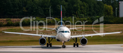 airplane front close-up view airfield ground day time