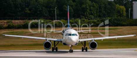 airplane front close-up view airfield ground day time