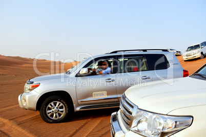 dubai, uae - september 12: the dubai desert trip in off-road car