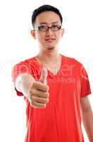 thumb up good looking young southeast asian male