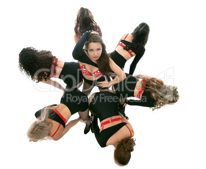 Seductive young dancers posing in studio